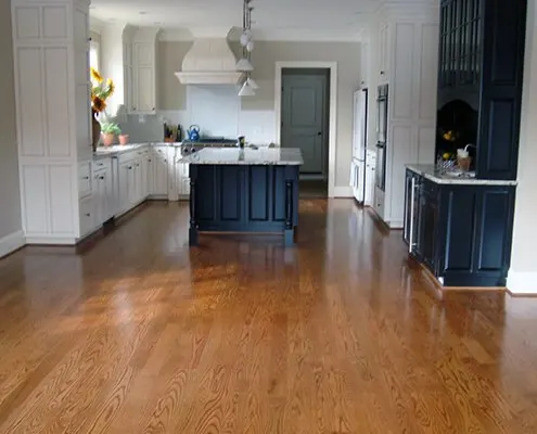 Kitchen with gleaming hardwood floor installation